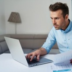 Man Using a Laptop